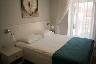 Гостевой дом Вилла Виталия Ейск Стандартный четырехместный номер-1